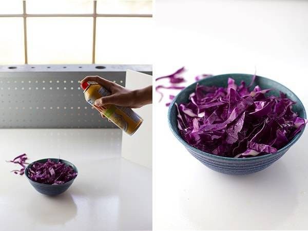 Nonstick cooking spray on food.