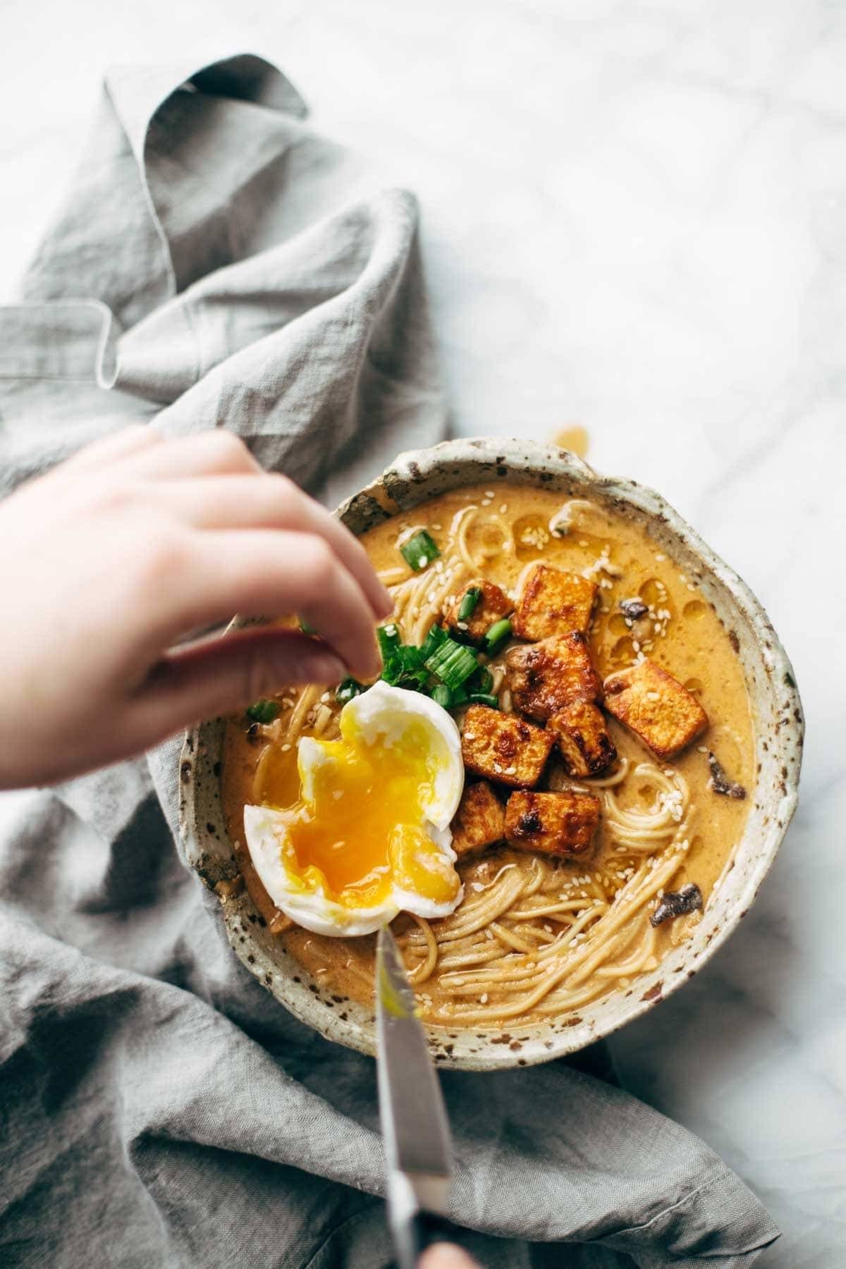 Homemade Spicy Ramen recipe with an easy spicy miso paste for the broth and dry ramen noodles that taste JUST like fresh! Vegetarian / vegan. | pinchofyum.com