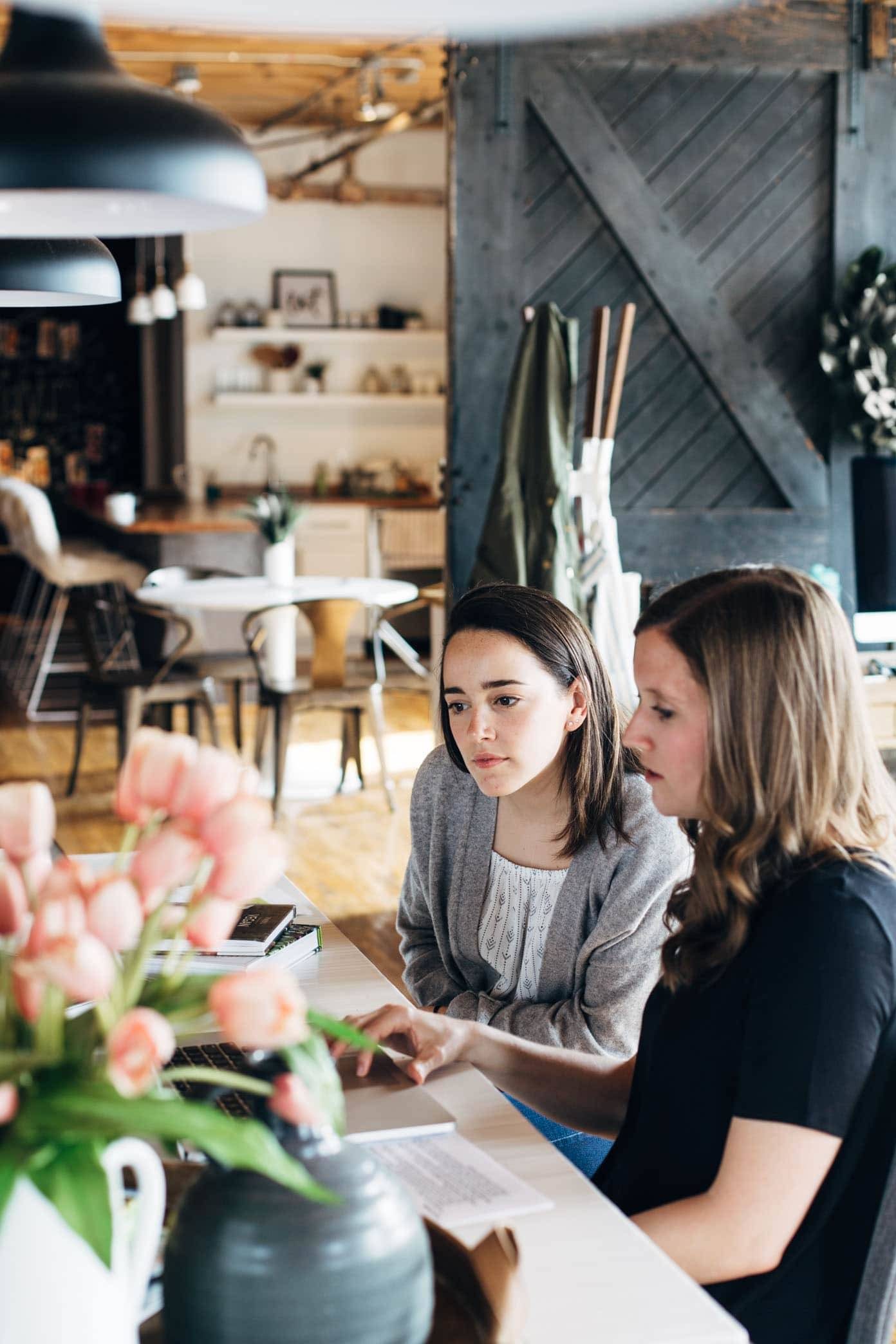 Women looking at a computer.