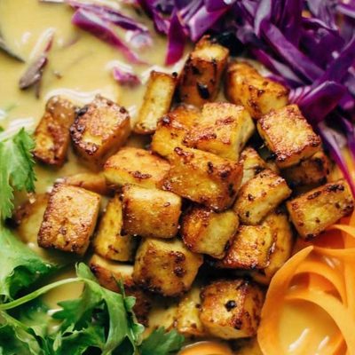 Coconut Curry Soup in a bowl with tofu.