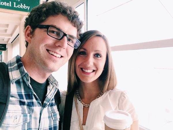 Man and woman smiling.