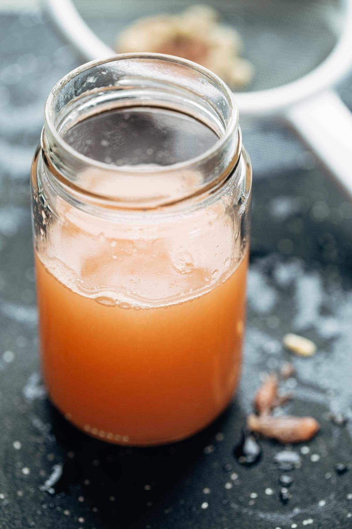 Grapefruit juice in a jar.
