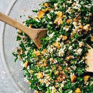 The Best Simple Kale Salad featuring a lemon and olive oil dressing, homemade breadcrumbs, and Parmesan cheese. YUM!